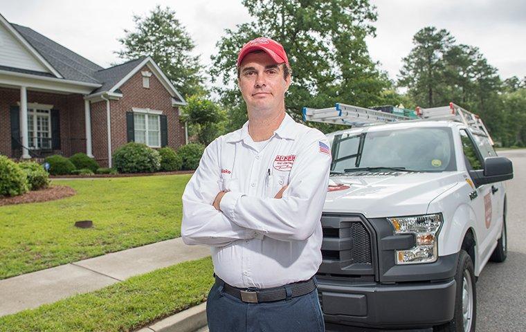 aiken tech in front of company truck