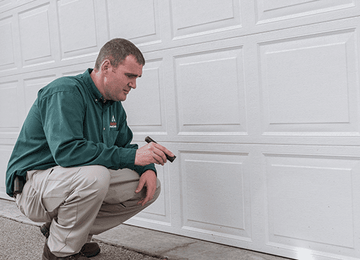 Action Can Help You Keep Fall Pests Out terre haute pest control technician inspecting for bugs