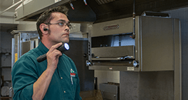 tech inspecting commercial kitchen in louisville