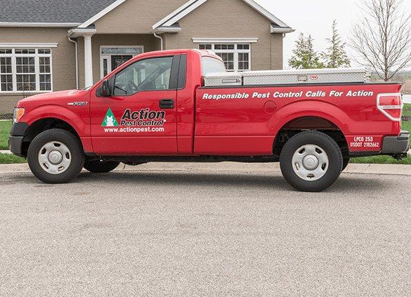 Interior Home Pest Control Services pest technician in front of company car