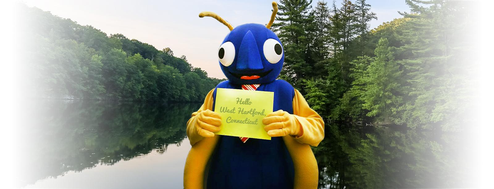 Person in bug costume holding sign that says Hello West Hartford Connecticut