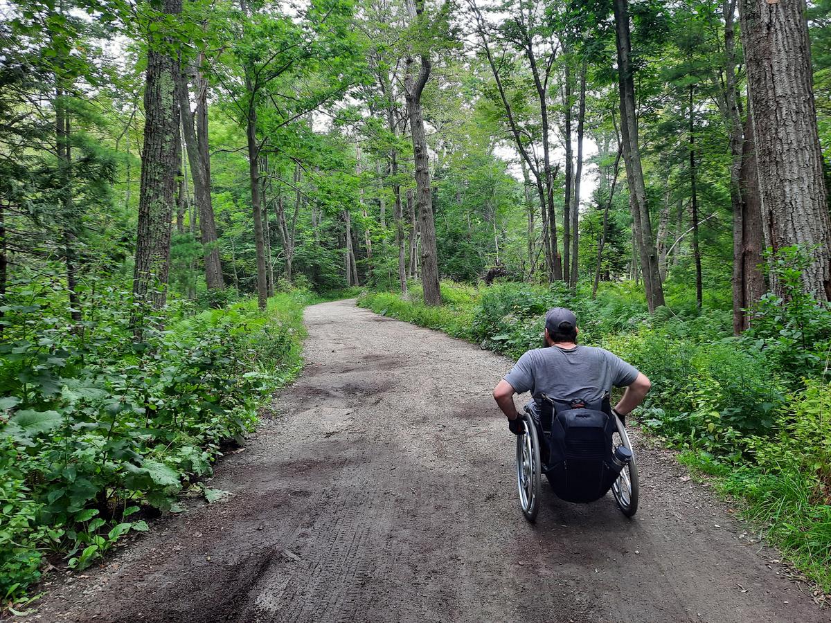 Heading down the road toward the Pond Trail. Photo credit: Enock Glidden