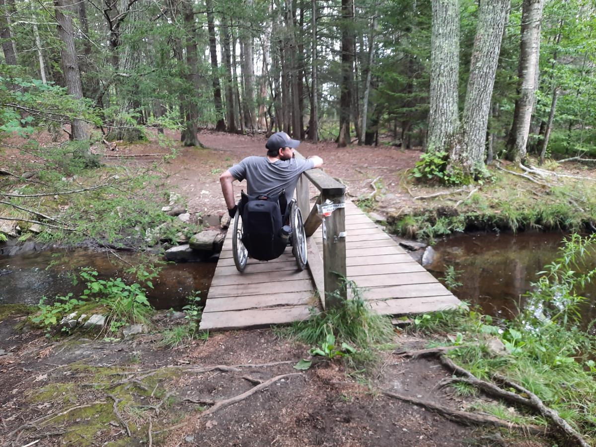 The bridge with a center railing. Photo credit: Enock Glidden