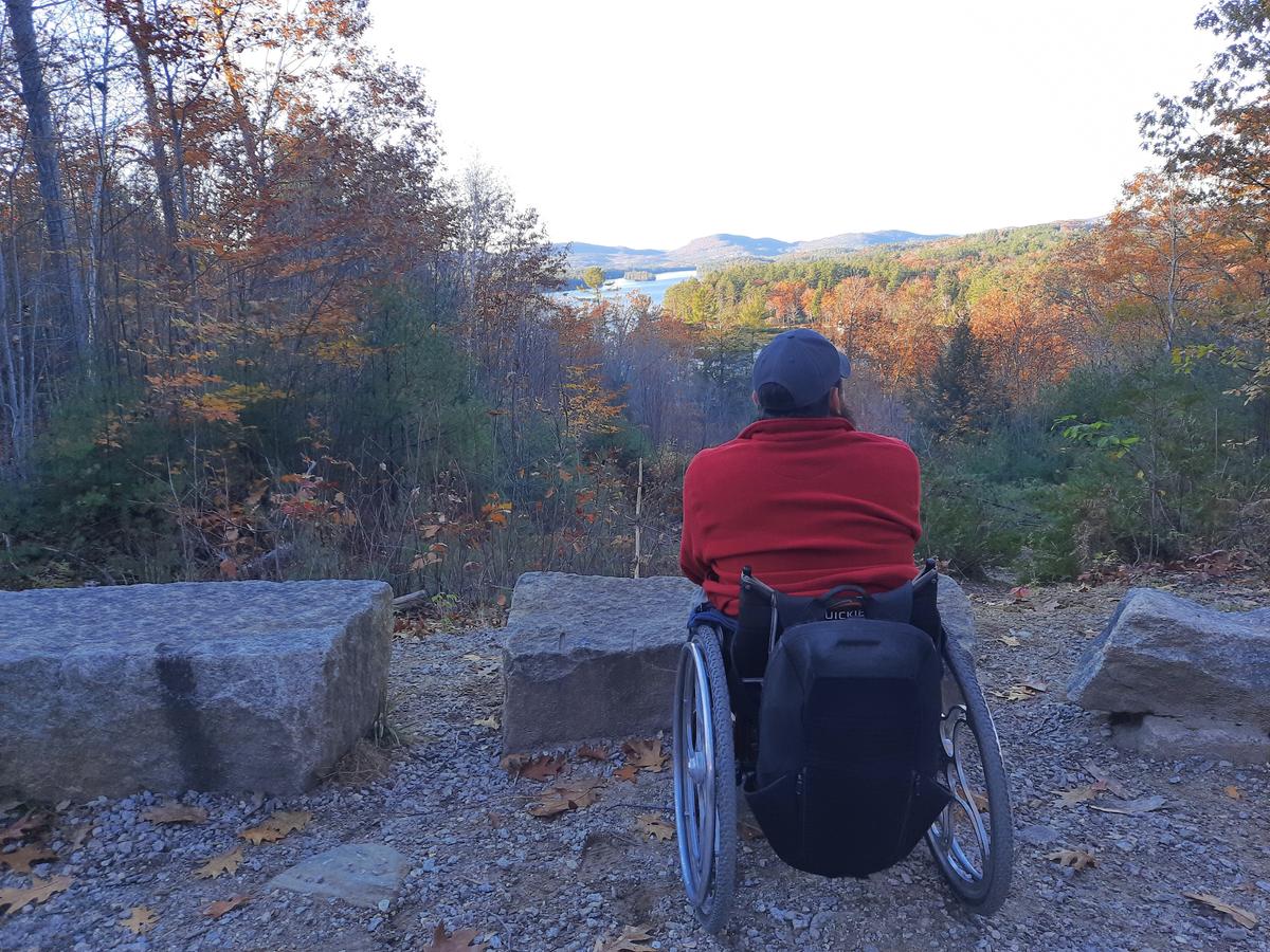 Enock enjoying the view on the Libby Trail. Photo credit: Enock Glidden