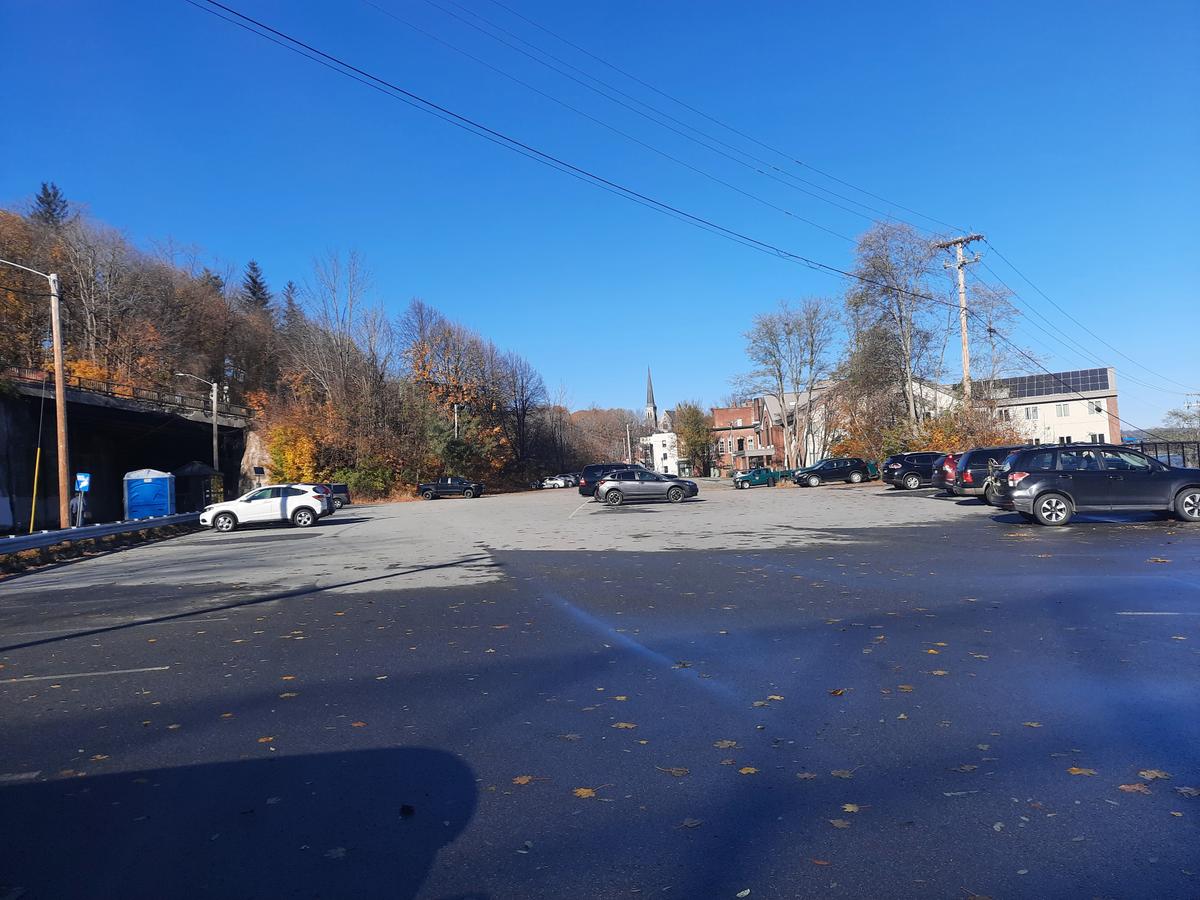 The large, paved parking lot at the Maine IF&W Offices. Photo credit: Enock Glidden