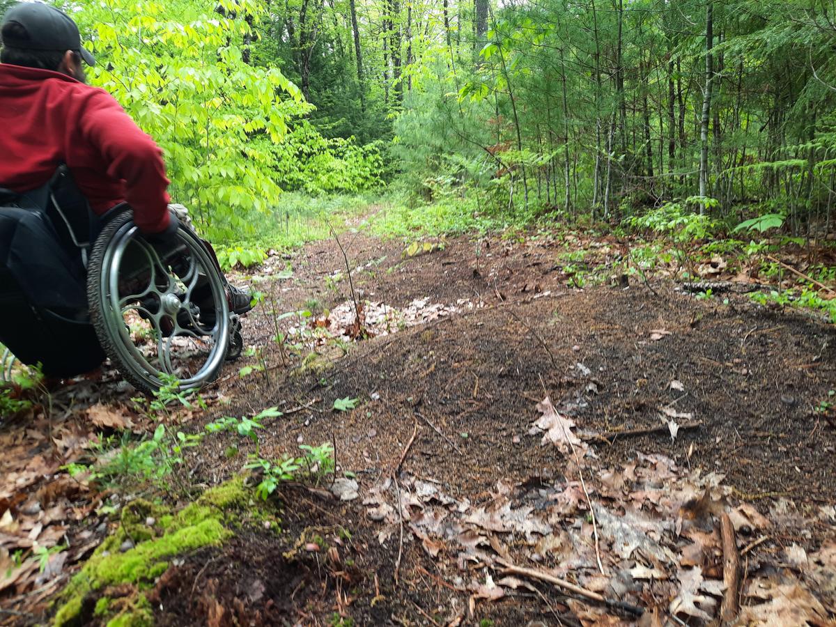 Maneuvering a difficult section of trail.