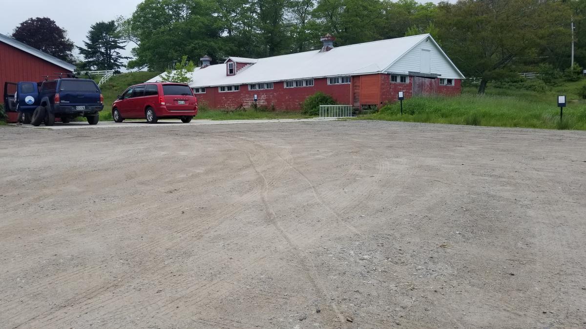 Parking lot at Woodward Preserve with a concrete pad.