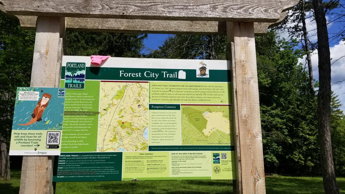 Kiosk for the Forest City Trail and Evergreen Cemetery.