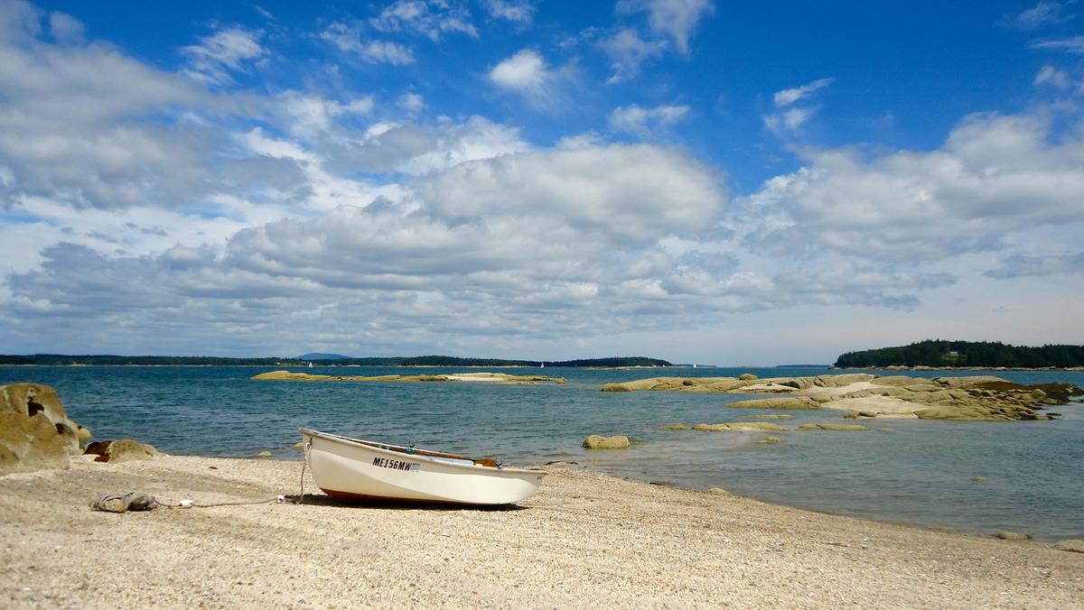 With the sun shining and the ocean breeze blowing, an island beach is the perfect place for a summer lunch. Deer Isle.