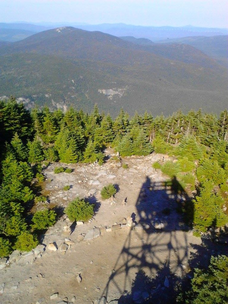 Shadow of the tower on top of Old Speck and the mountains beyond (Credit: Lisa C)
