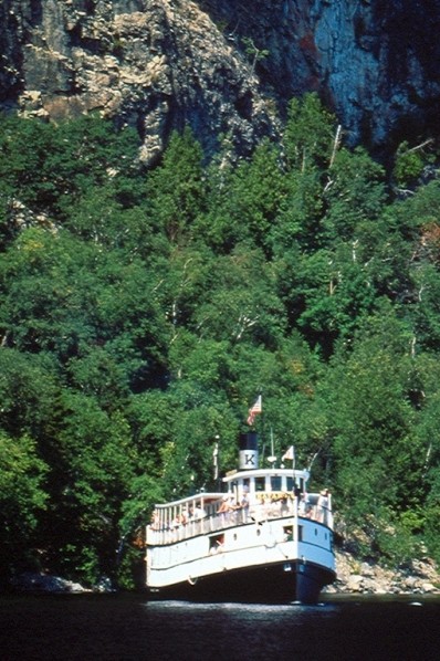 S.S. Katahdin on Moosehead Lake under the cliffs of Mount Kineo (Credit: Maine Bureau of Parks and Lands)