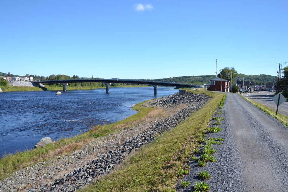 Riverside Trail west of and looking back at the Clair Fort Kent Bridge (Credit: Maine Trail Finder)