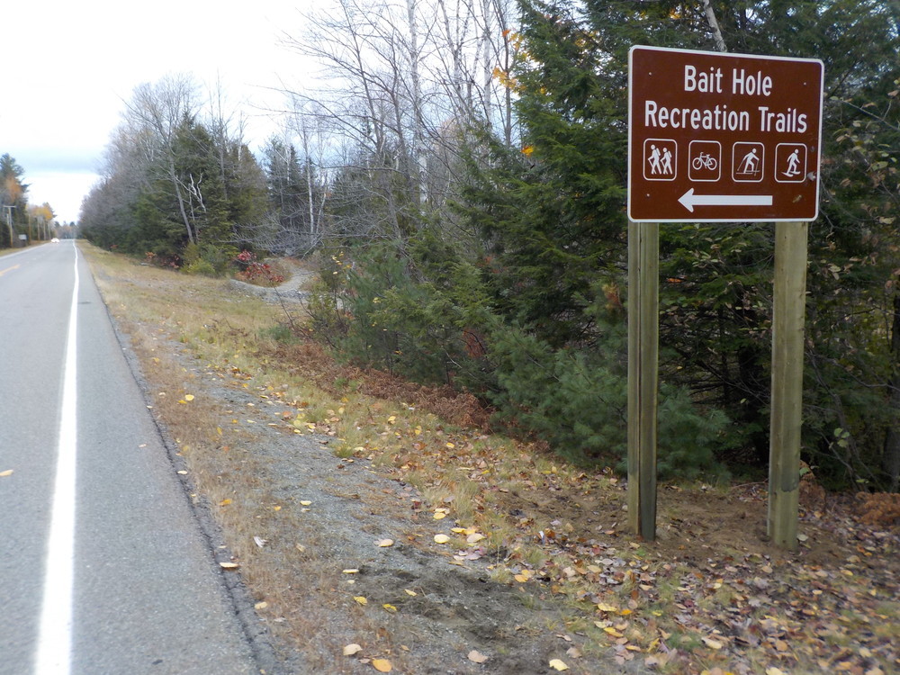 Entrance road sign at Bait Hole Recreation Trails