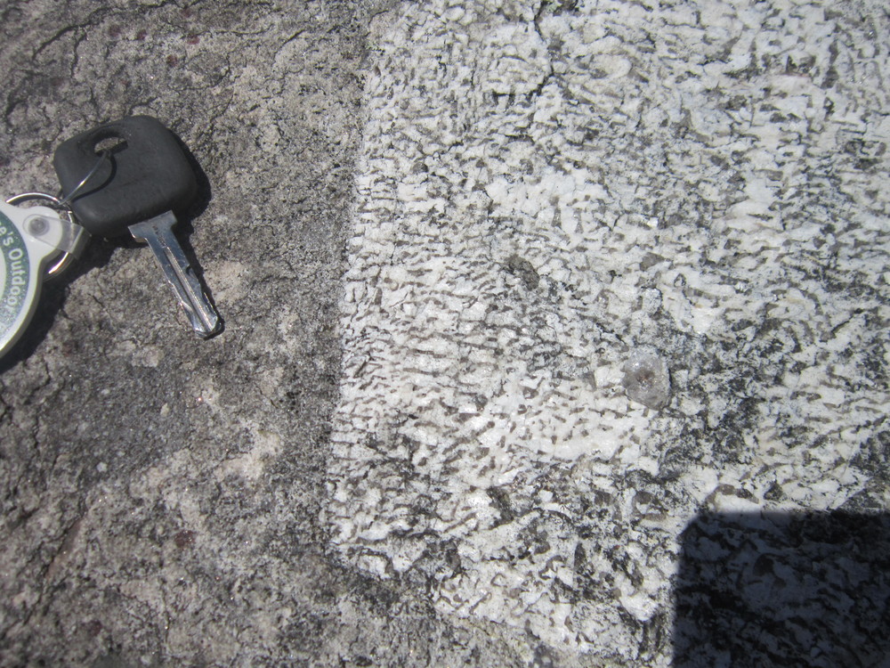 close up of the graphic texture in the feldspar crystals, white is feldspar and the gray is quartz. This texture can be found in many places on the summit. A large portion of Jockey Cap is granitic pegmatite (an exceedingly coarse grained granite).