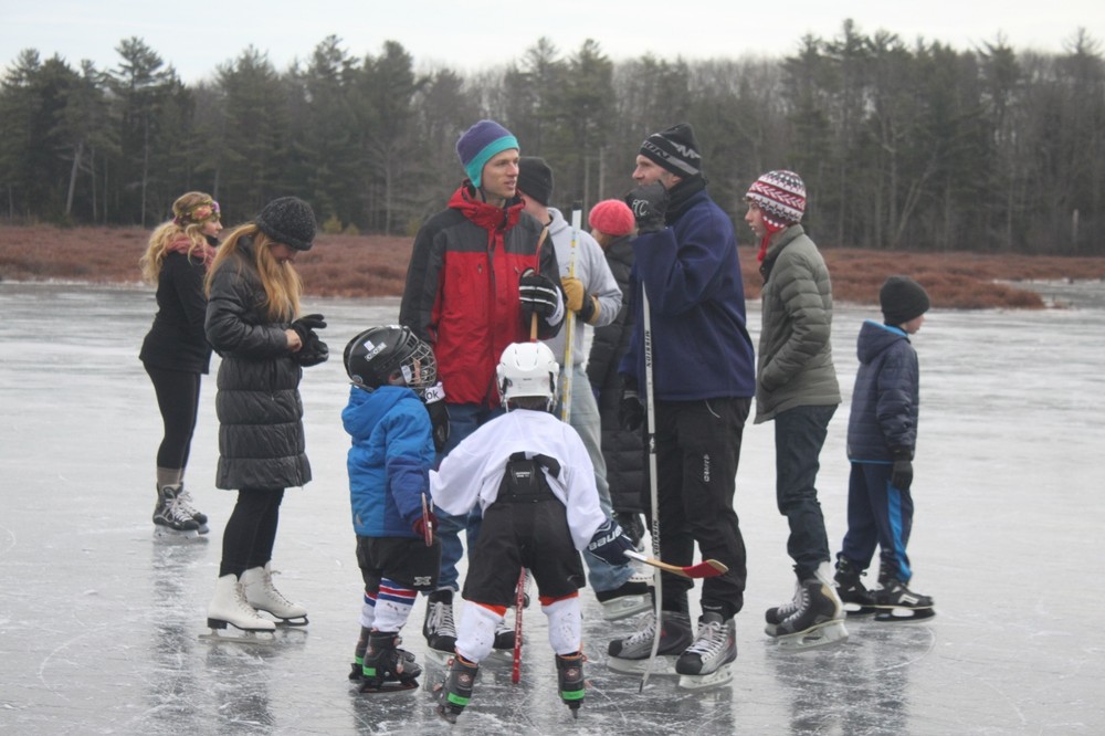 Hockey players on the pond (Credit: Royal River Conservation Trust)