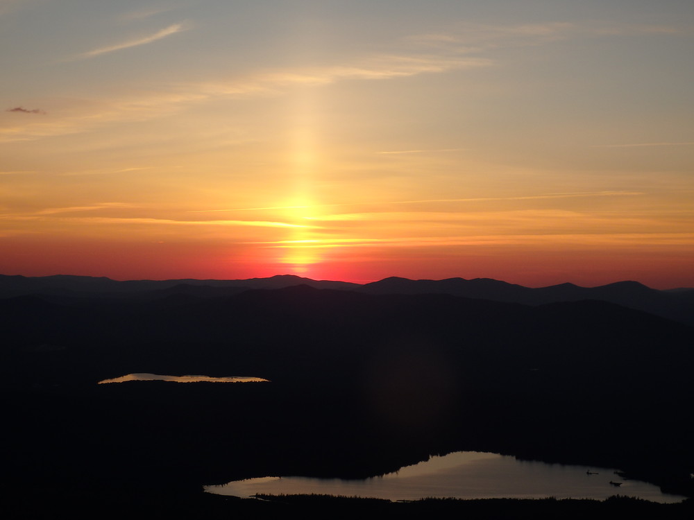 Sunset on July 5th, 2017 over Canada.  Viewed from Saddleback's summit. (Credit: Robert Ratford)