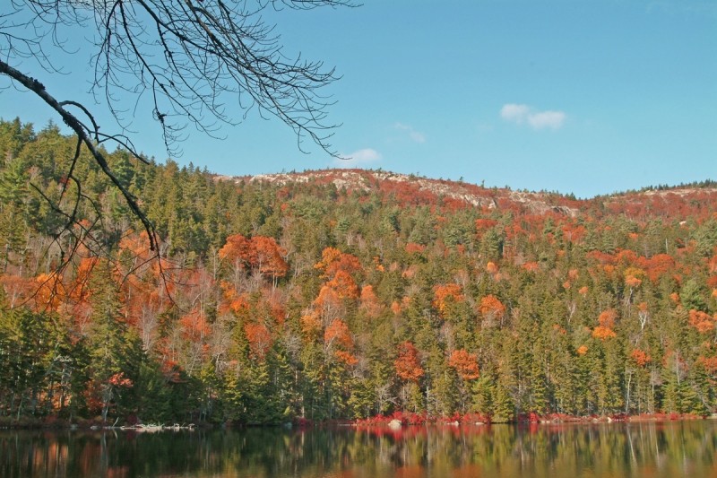 Autumn foliage on Tunk Mountain viewed from Little Long Pond (Credit: Maine Bureau of Parks and Lands)