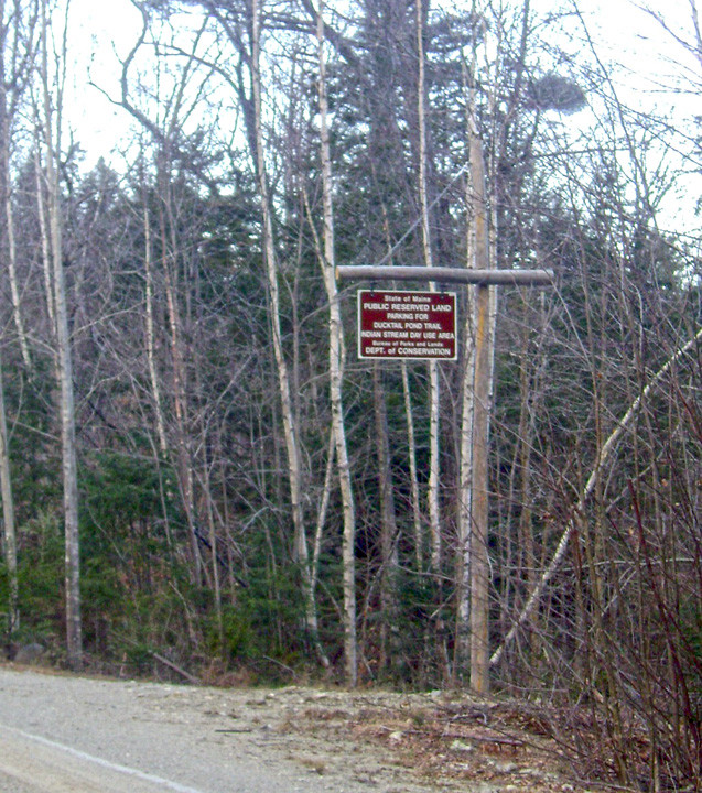 Trailhead yard-arm sign near parking area (Credit: Maine Bureau of Parks and Lands)