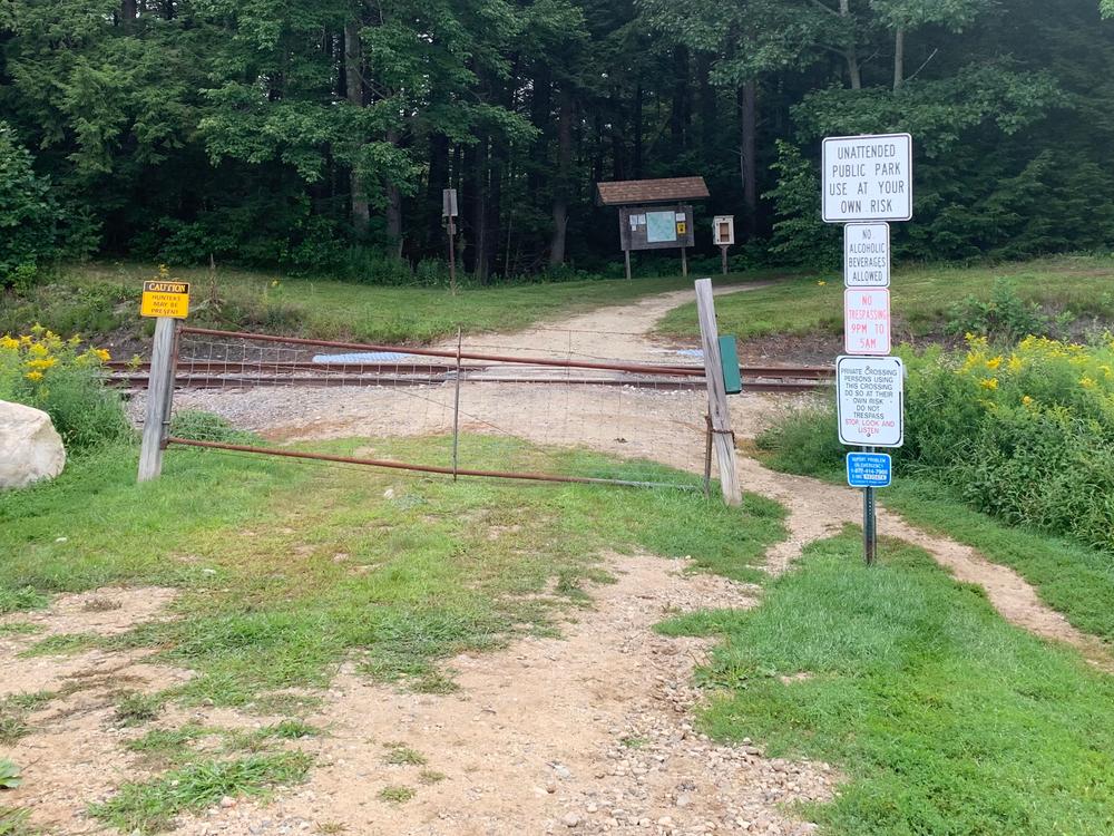 Gate and train tracks at trail access