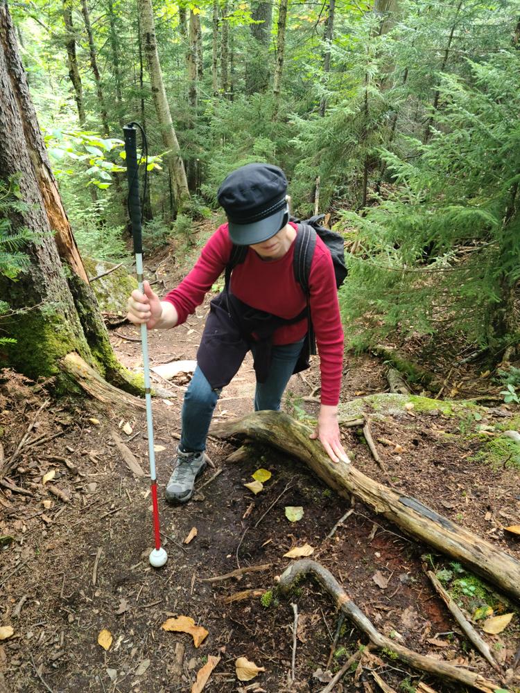 That's not a trekking pole. She is legally blind as of 5 years ago, but doesn't let it stop from enjoying one of her lifelong passions. She's a true inspiration! her from (Credit: Brian Marston)
