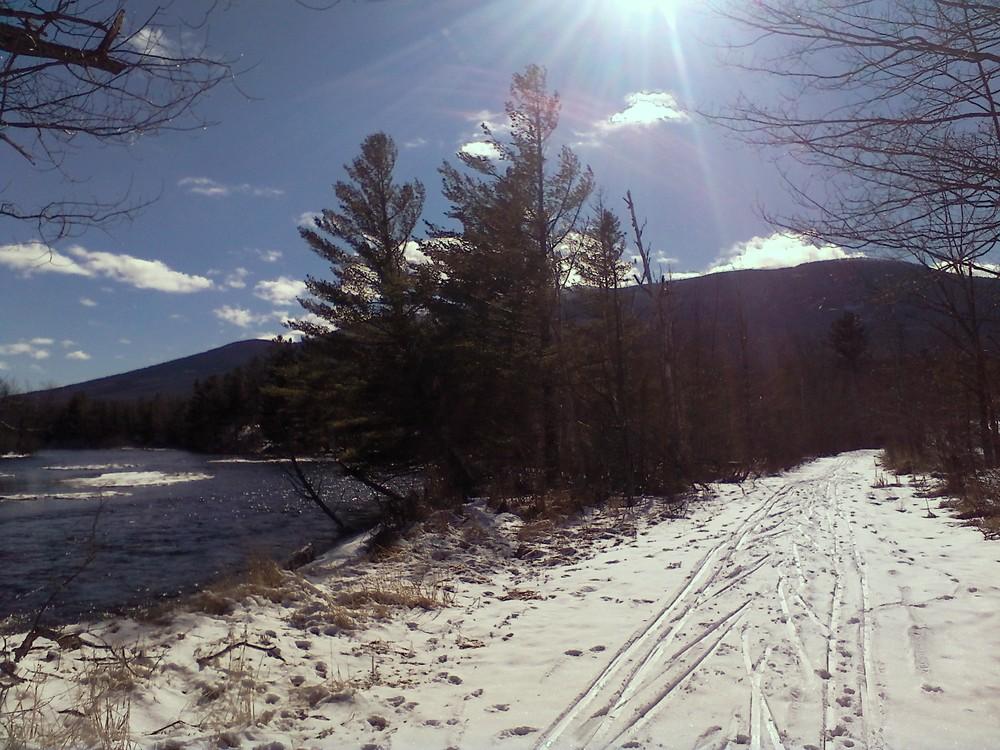 Maine Trail Finder (Credit: Skiing along the East Branch Penobscot on a blue bird day)