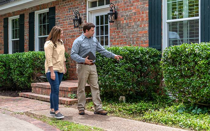 a homeowner and tech inspecting