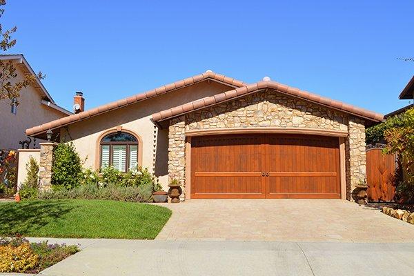 a one story house with attached garage
