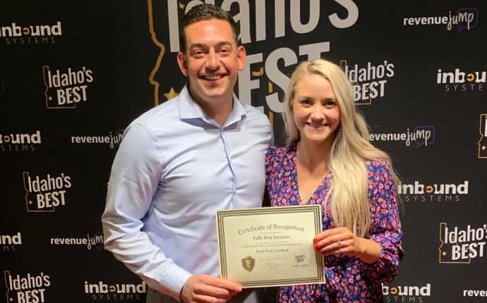 owner and wife holding idahos best certificate in idaho falls