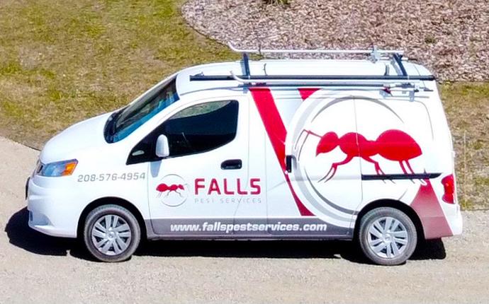 Our Follow Up Services Make Sure Pests Are Gone company van pulling up to house in idaho falls