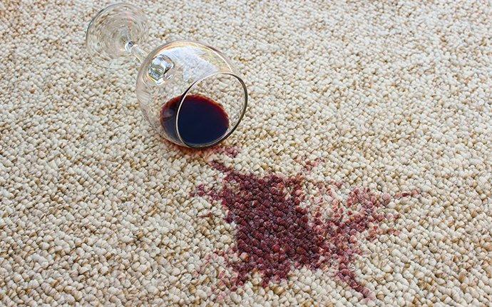 a wine stain on a nice carpet