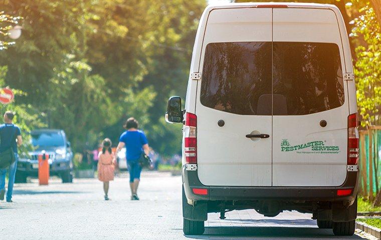 pestmaster services van on street near a school in jacksonville florida