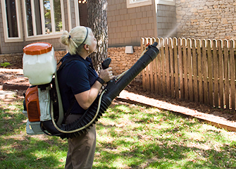 Seasonal Mosquito Treatments family enjoying their mosquito free yard in Tulsa