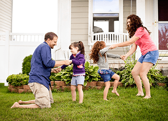 Seasonal Mosquito Treatments family enjoying their mosquito free yard in Tulsa