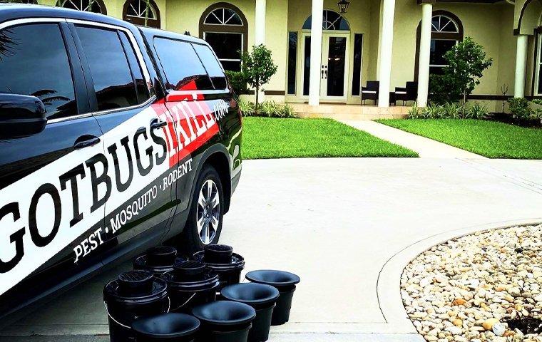 gotbugsikill vehicle in front of a home