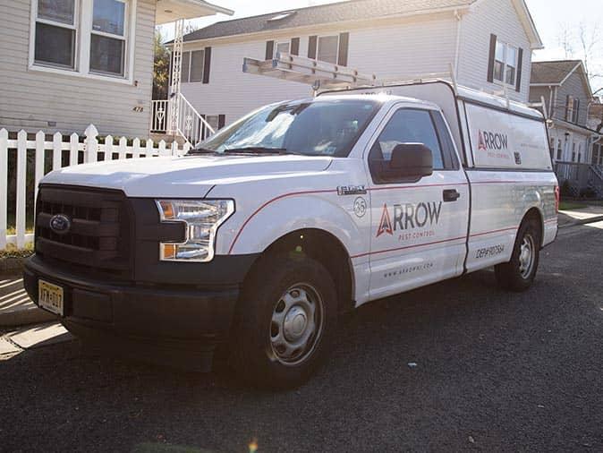 vehcile parked outside of nj home with pest problems