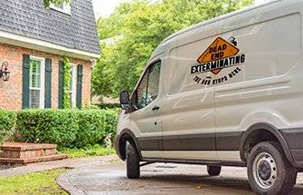 company van in front of home