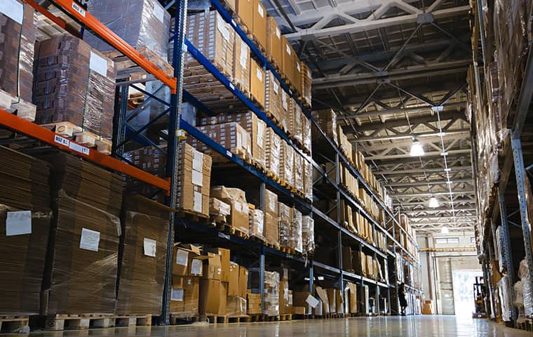interior of a stocked industrial warehouse serviced by pest control consultants in batavia illinois