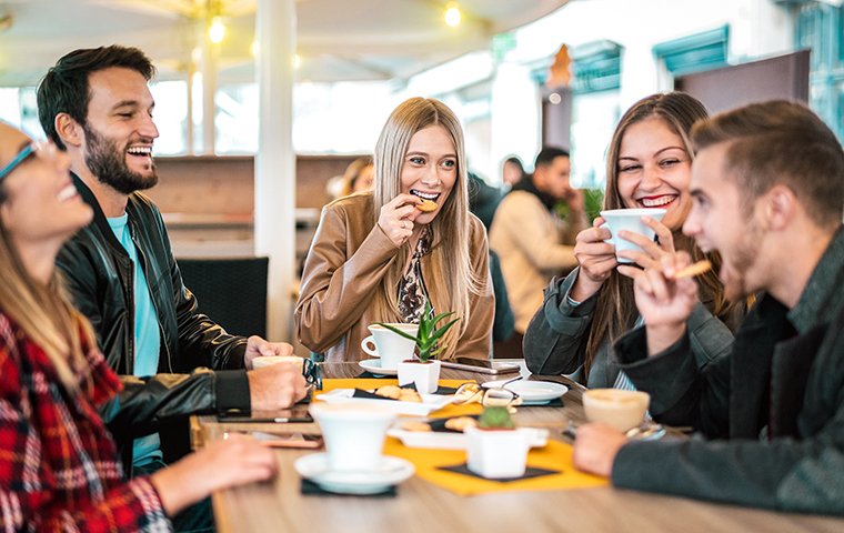 group of friends eating at a restaurant