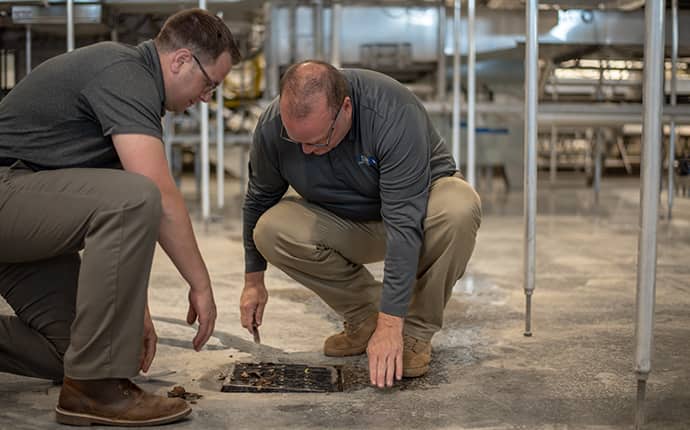 Sanitation Services For Your Commercial Business prosite pest control service experts performing professional sanitation services inside of a commercial business in central washington