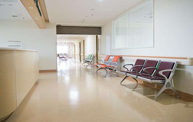 empty chairs in medical hallway