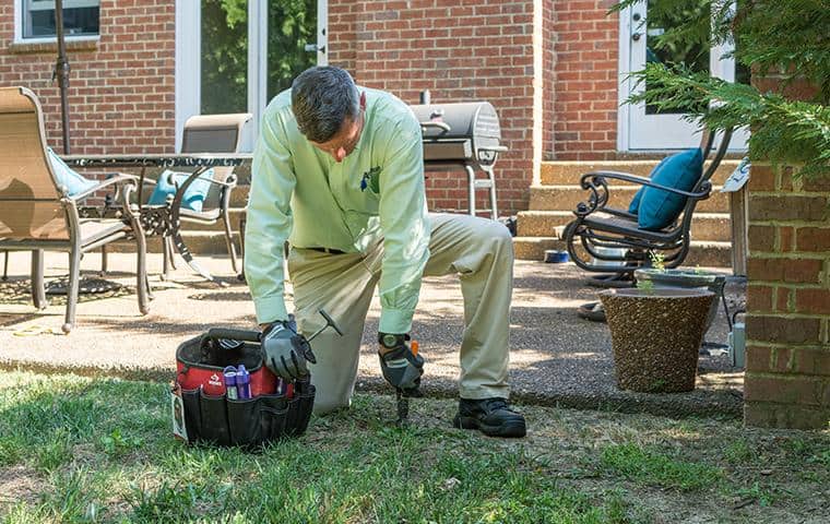 There's No Drilling, Trenching, Or Chemical Injection With Sentricon nashville termite control specialists installing sentricon system