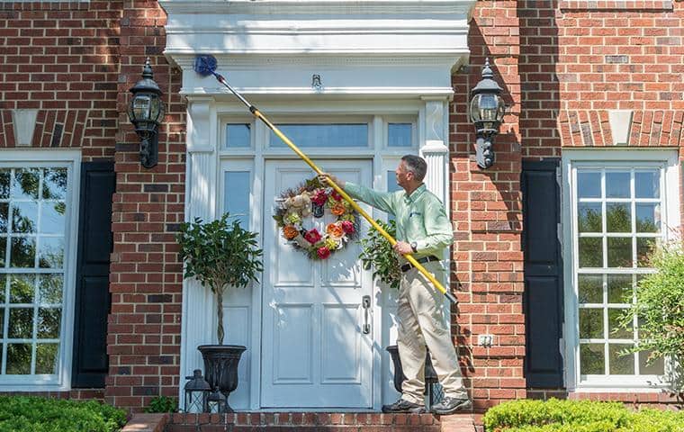 Cobweb Removal all-american takes care of spider webs on the exterior of homes