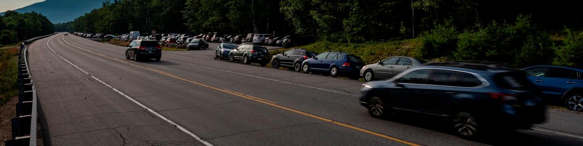 A long line of cars at Appalachia parking lot