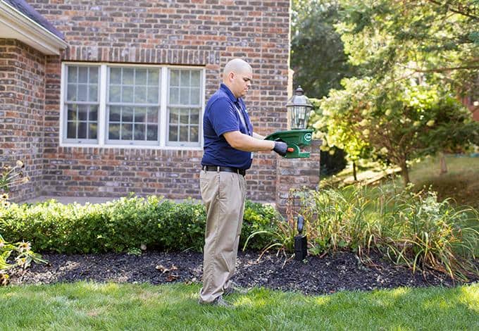 Professional Flea & Tick Control long island exterminator treating yard for fleas and ticks