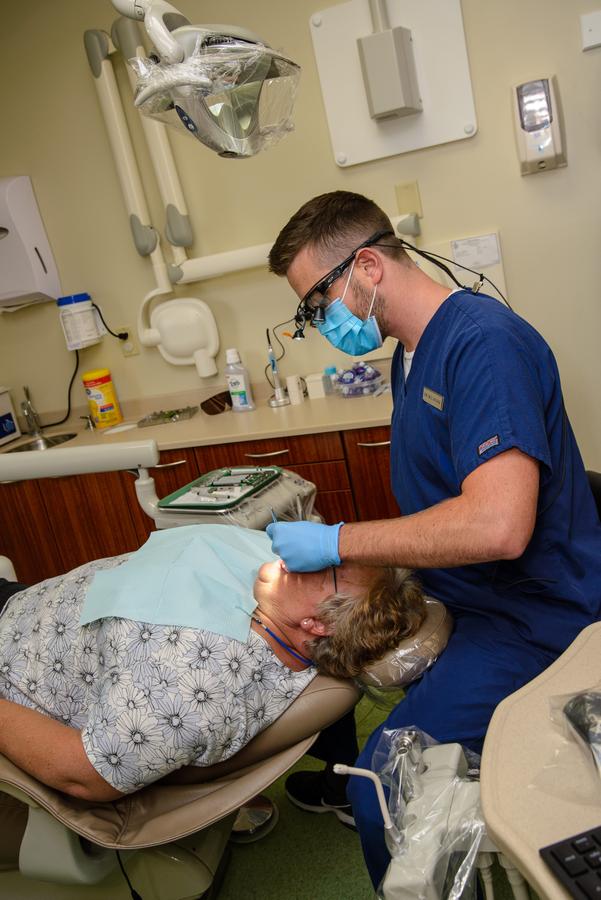 Dr. Belanger examines a patient