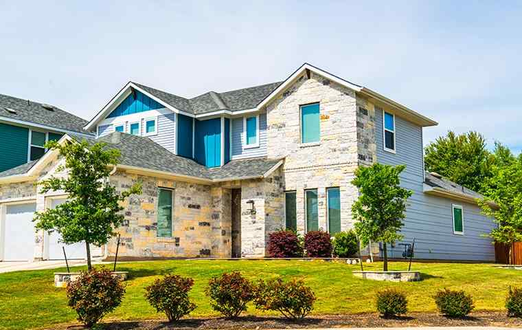street view of a home and lawn in highland village texas
