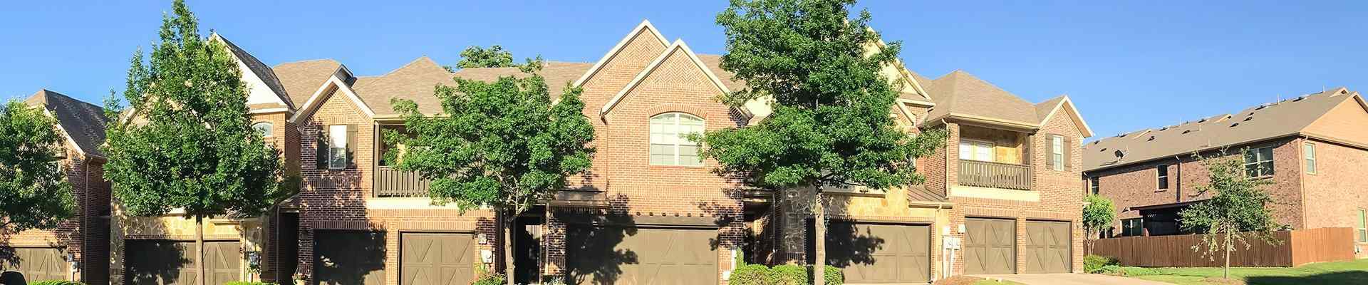 a row of homes in a suburban neighborhood in allen texas