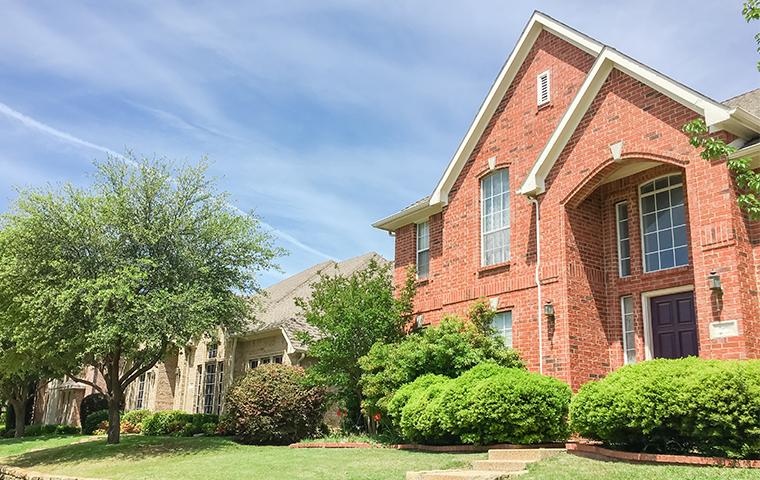 a brick two story house